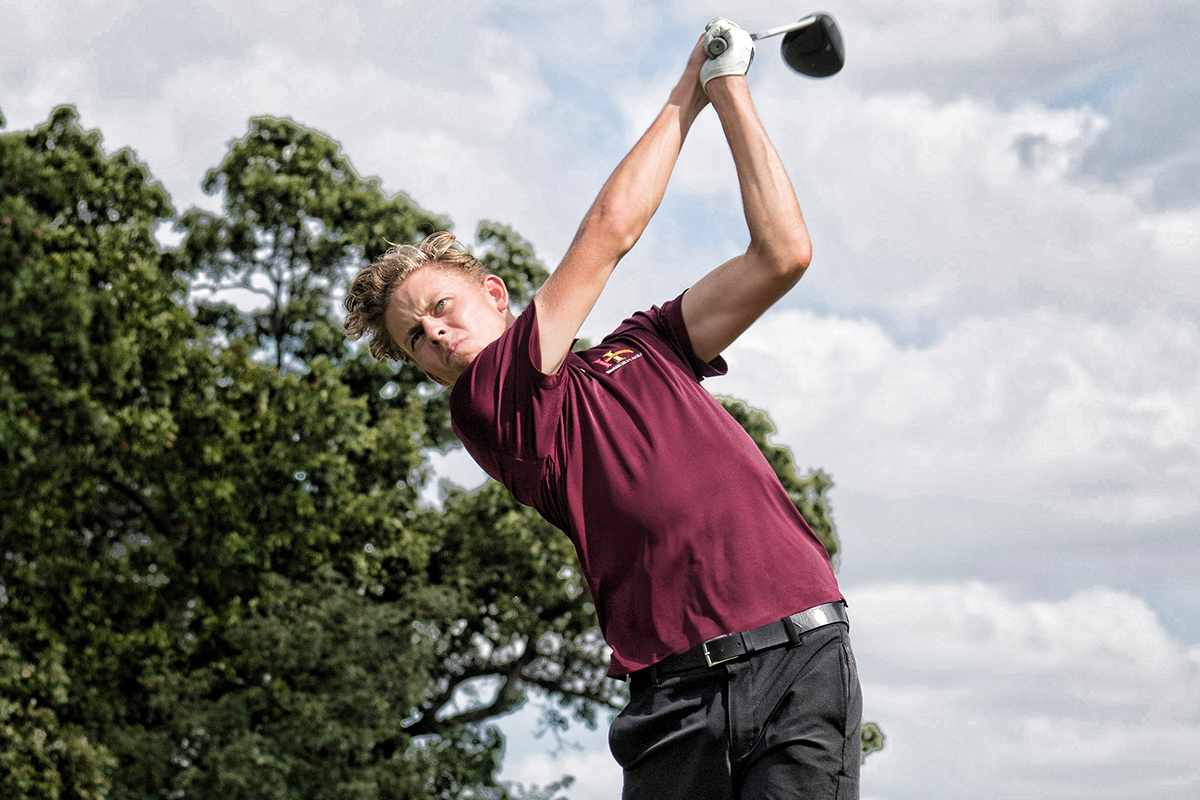 Indian Hills Student-Athlete swinging his driver over his shoulder.
