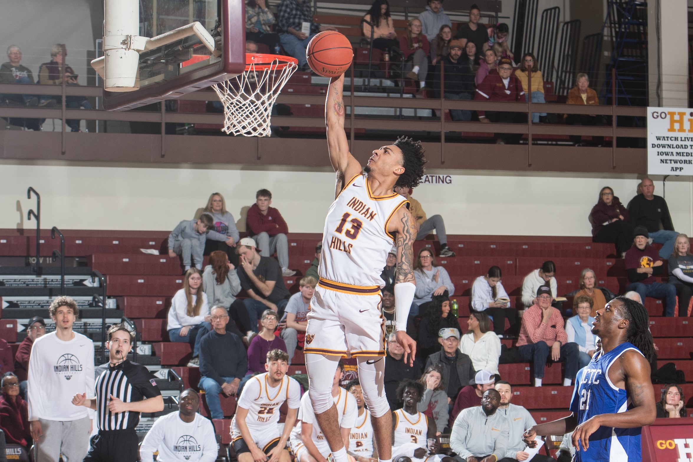 OFFENSE ERUPTS IN 103-79 VICTORY AT HELLYER