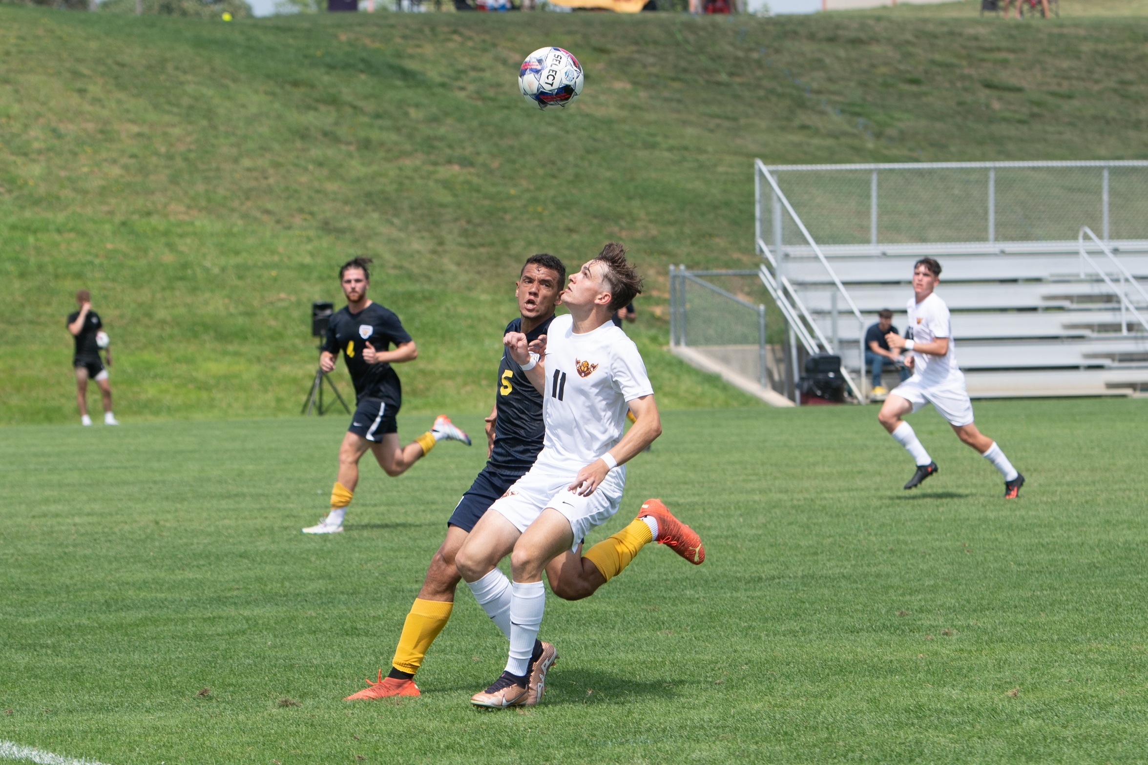 BAUER'S GOAL SALVAGES DRAW IN KANSAS