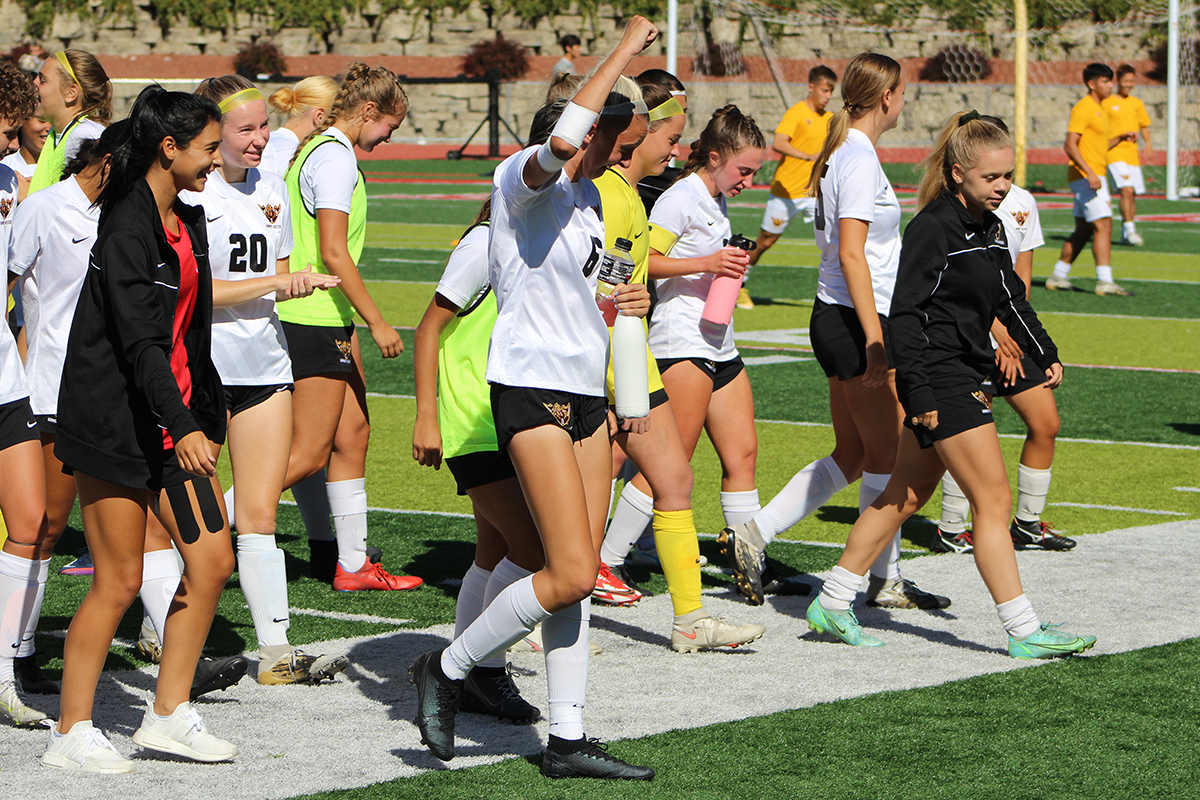 NO. 10 WARRIORS EARN SIGNATURE WIN