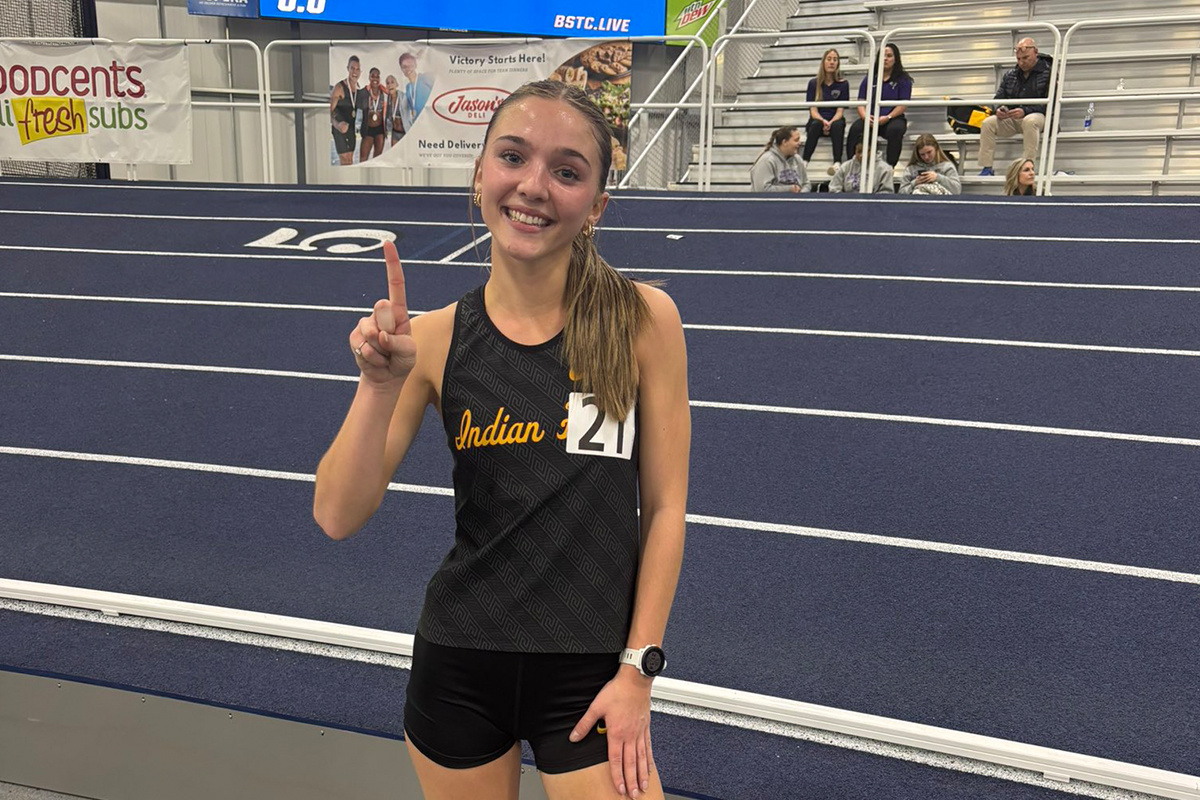 SCHOOL RECORDS FALL AT WASHBURN OPEN